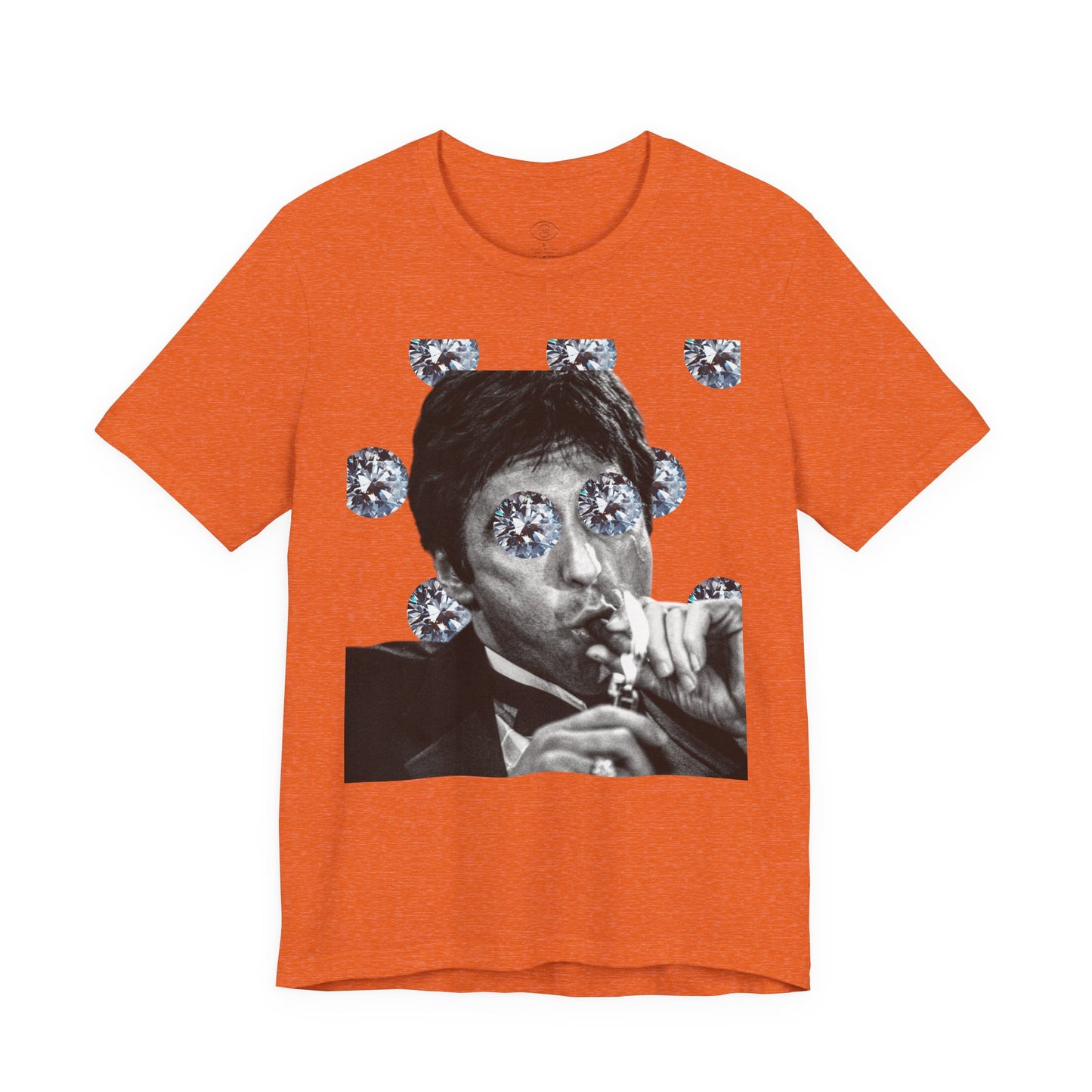 Orange t-shirt with a graphic of a person with diamonds for eyes on a white background
