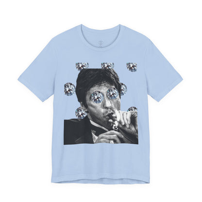 Light blue t-shirt with a graphic of a person with diamonds around their eyes on a white background
